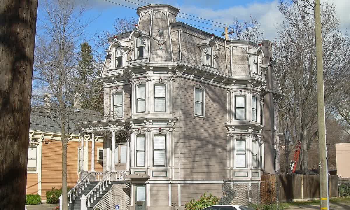 Three-story Second Empire style house with a mansard roof on 8th Street
